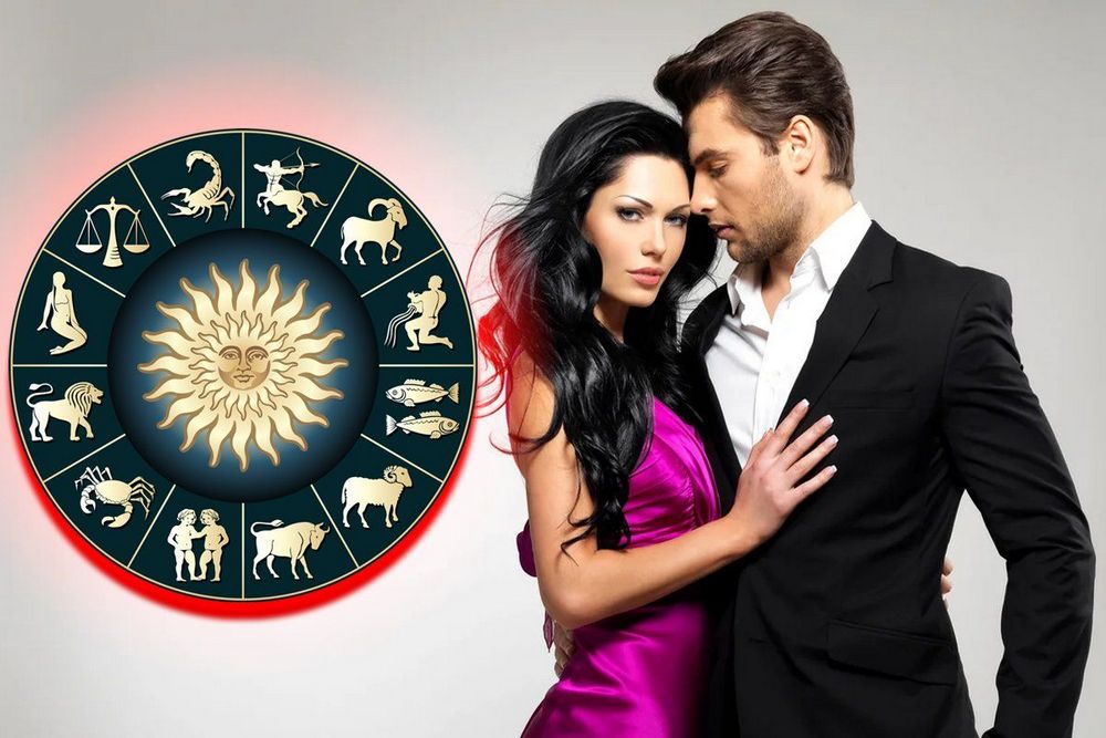 Мужчина и женщина возле зодиакального круга