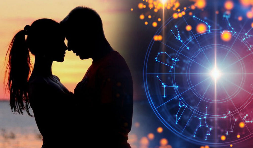 Тень молодой пары возле зодиакального колеса